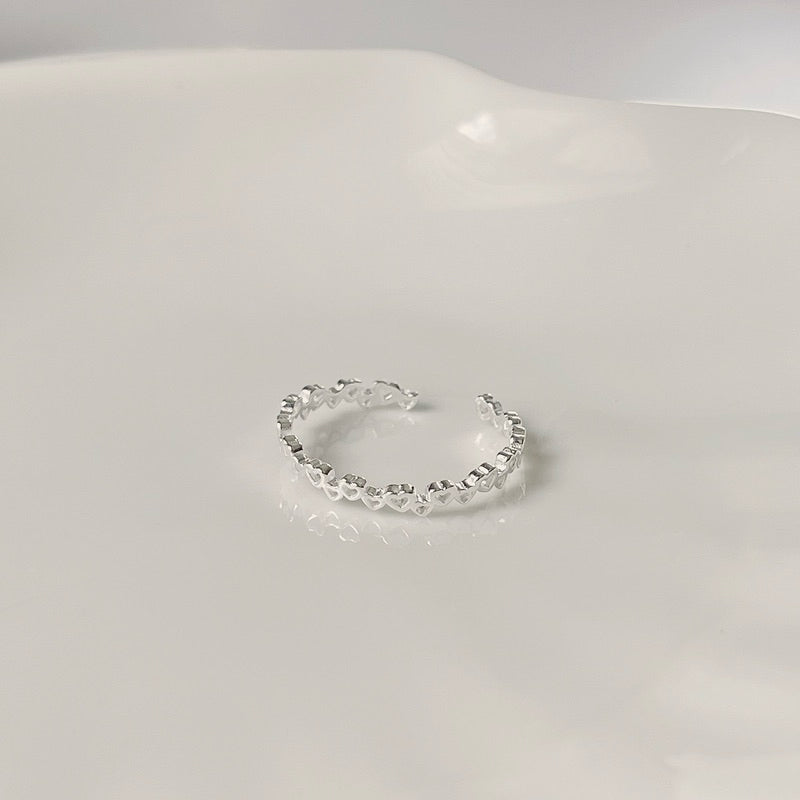 Amy Row of Heart Shaped Ring