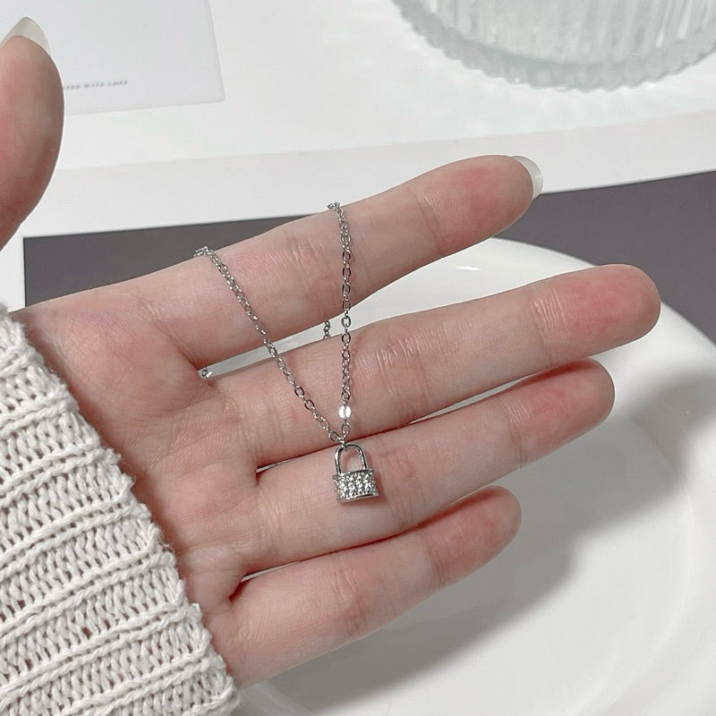 Jannie Lock Pendant Necklace