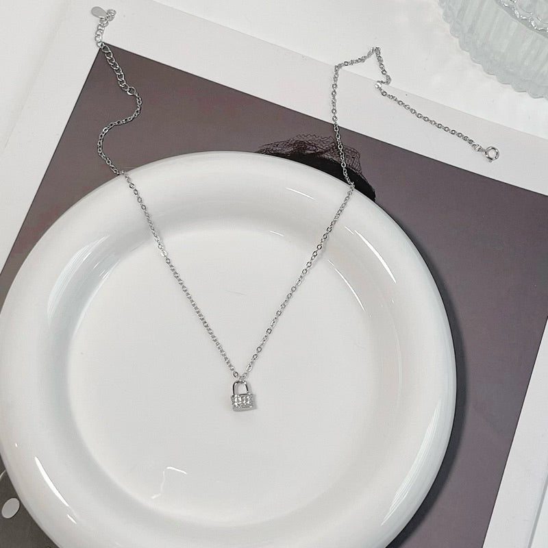 Jannie Lock Pendant Necklace