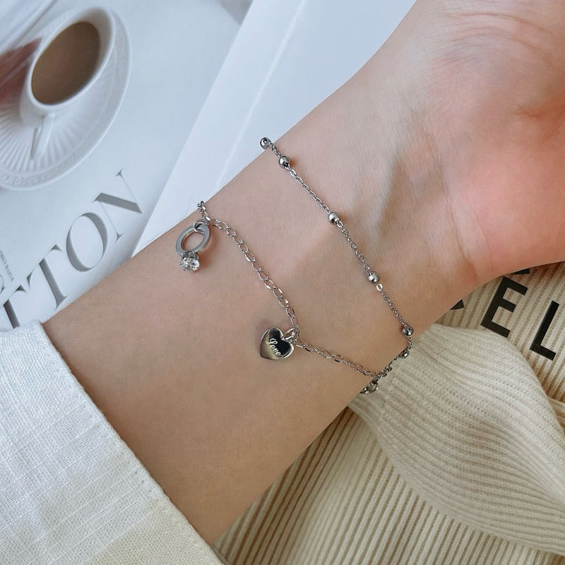 Zyra Double Layered Ring Heart Tag Pendant Bracelet