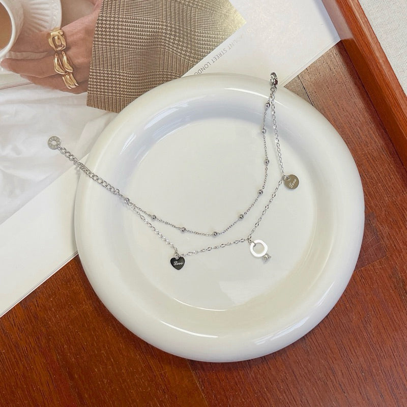 Zyra Double Layered Ring Heart Tag Pendant Bracelet