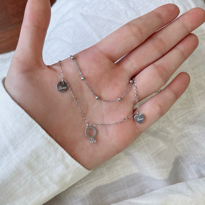 Zyra Double Layered Ring Heart Tag Pendant Bracelet